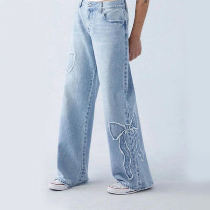Clomet | Video Jeans med Broderede Sløjfer