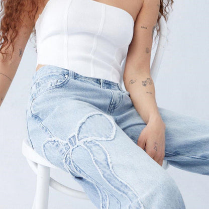 Clomet | Video Jeans med Broderede Sløjfer