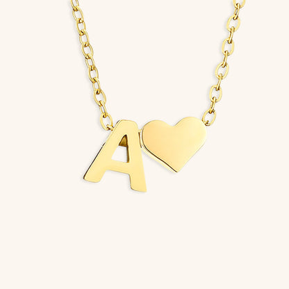 navnesmykke med initialen Ria | 18k Guld
