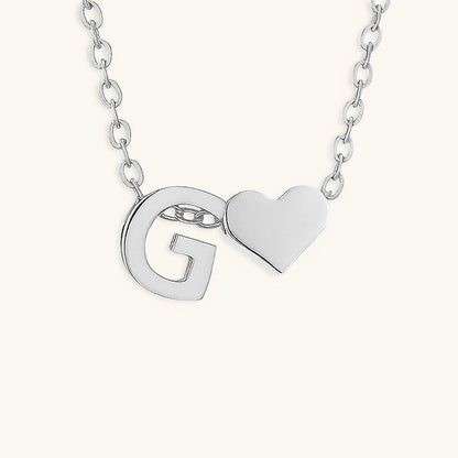 navnesmykke med initialen Ria | 18k Guld