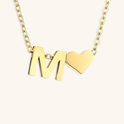 navnesmykke med initialen Ria | 18k Guld