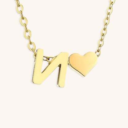 navnesmykke med initialen Ria | 18k Guld