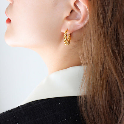 Guldøreringe Aurum Twist | 18k Guld
