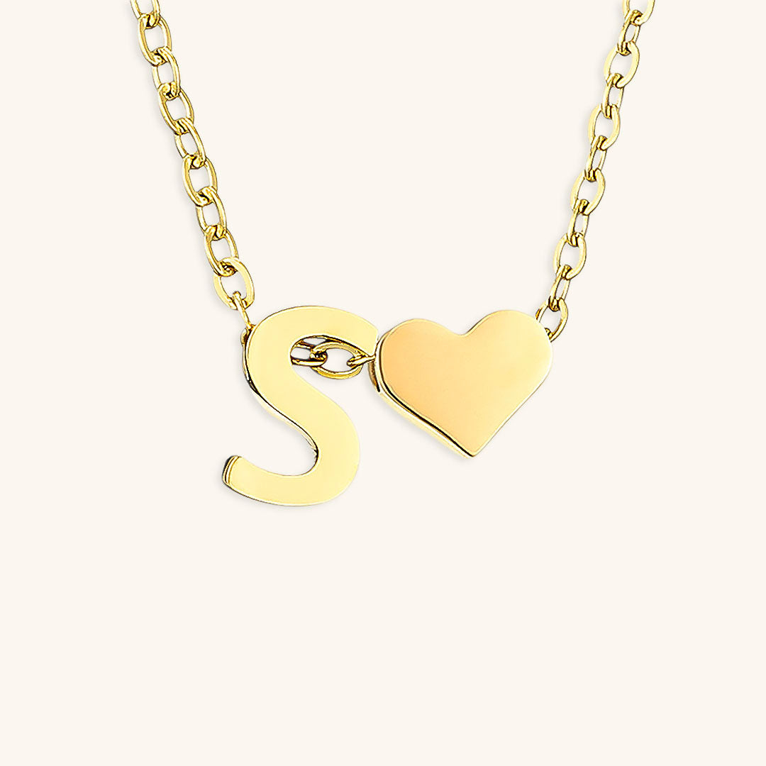 navnesmykke med initialen Ria | 18k Guld