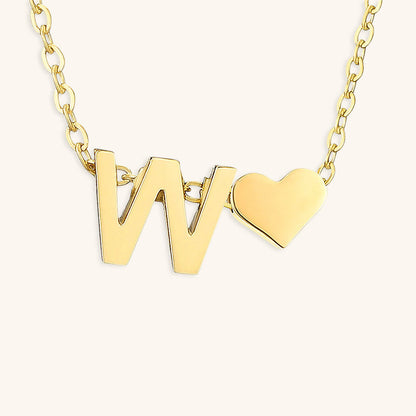 navnesmykke med initialen Ria | 18k Guld