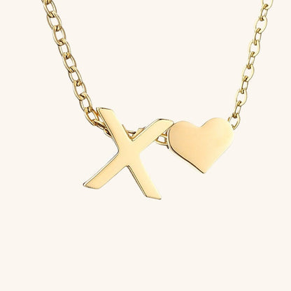 navnesmykke med initialen Ria | 18k Guld
