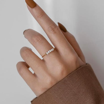 magnolia ring med ferskvandsperler | 18k guld