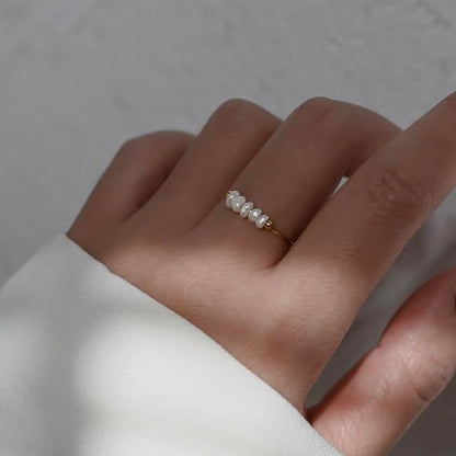 magnolia ring med ferskvandsperler | 18k guld
